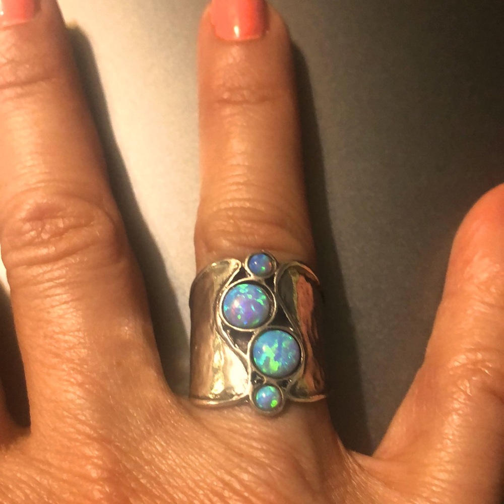 Sterling silver ring with opals.